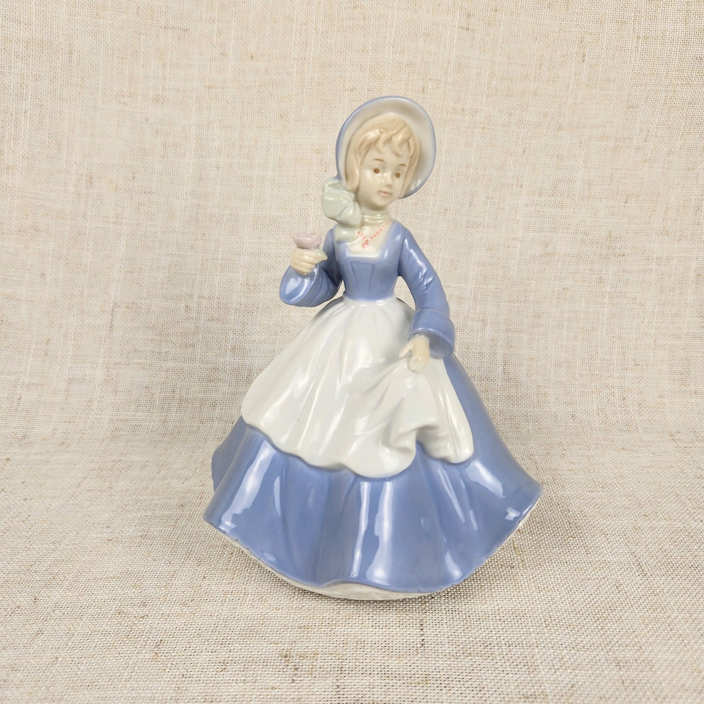 Vintage Made in Japan Porcelain Music Box Figurine | Girl in Blue Dress Holding Rose