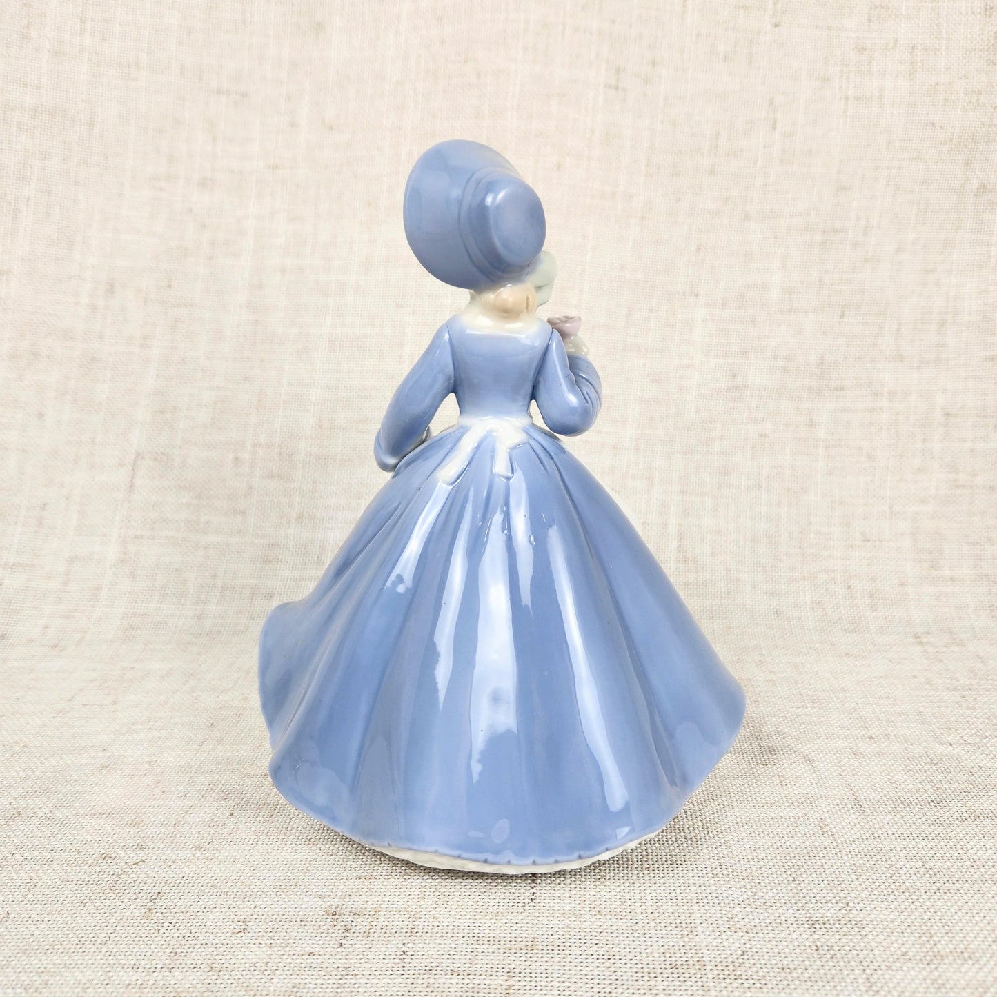 Vintage Made in Japan Porcelain Music Box Figurine | Girl in Blue Dress Holding Rose