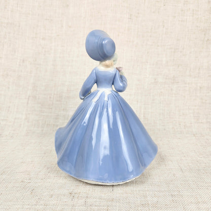 Vintage Made in Japan Porcelain Music Box Figurine | Girl in Blue Dress Holding Rose