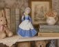 Vintage Made in Japan Porcelain Music Box Figurine | Girl in Blue Dress Holding Rose